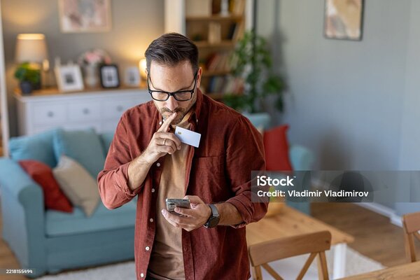 Man making card payment via phone 